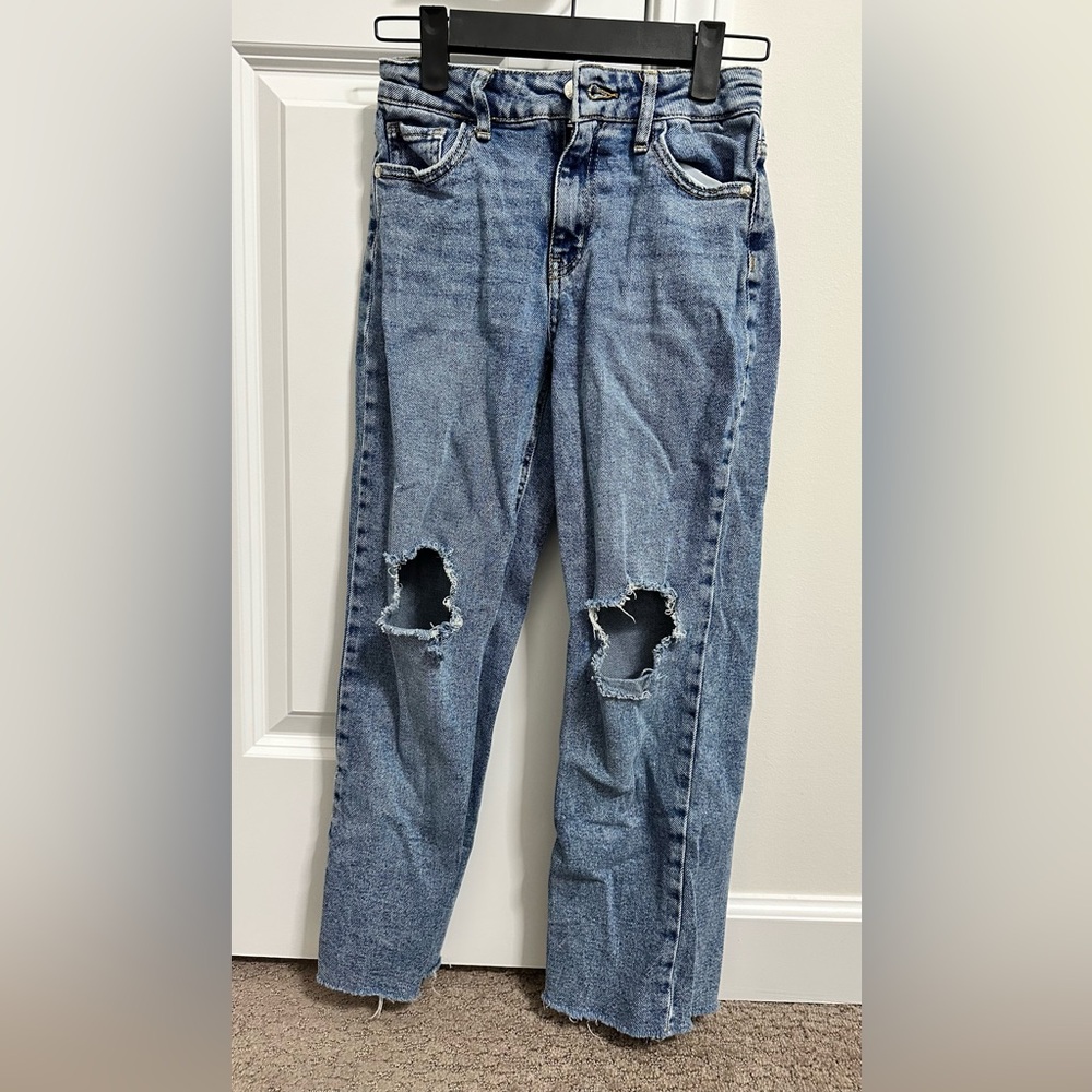 Distressed Light Wash Blue Denim Jeans